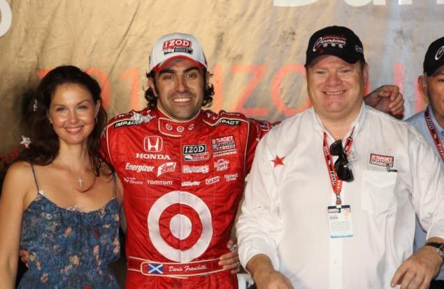 Dario Franchitti celebrates winning the 2010 IZOD IndyCar Series Championship. Photo by Chris Jones for IZOD IndyCar
